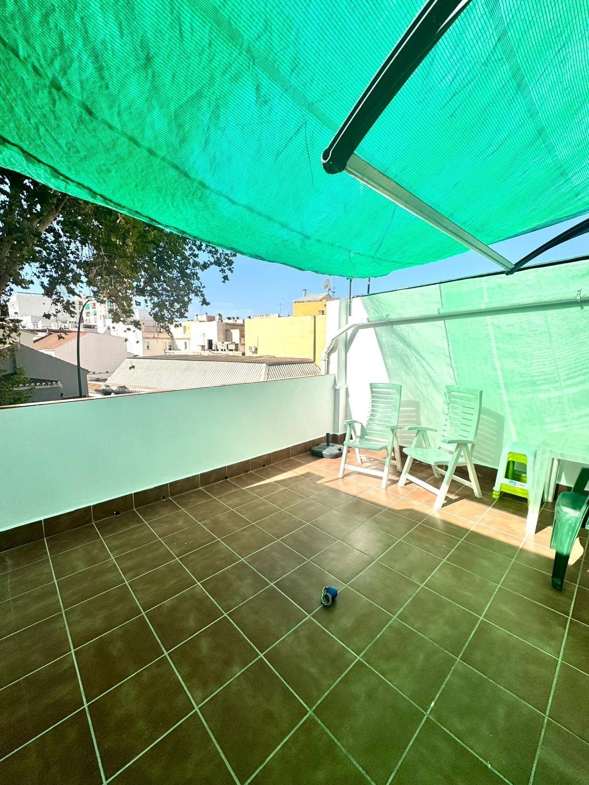 Casa céntrica con terraza